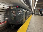 Arnine Car # 381 is on the point of the second NYCTA Holiday Nostalgic Train trip of the day-photo taken at 86th Street Station